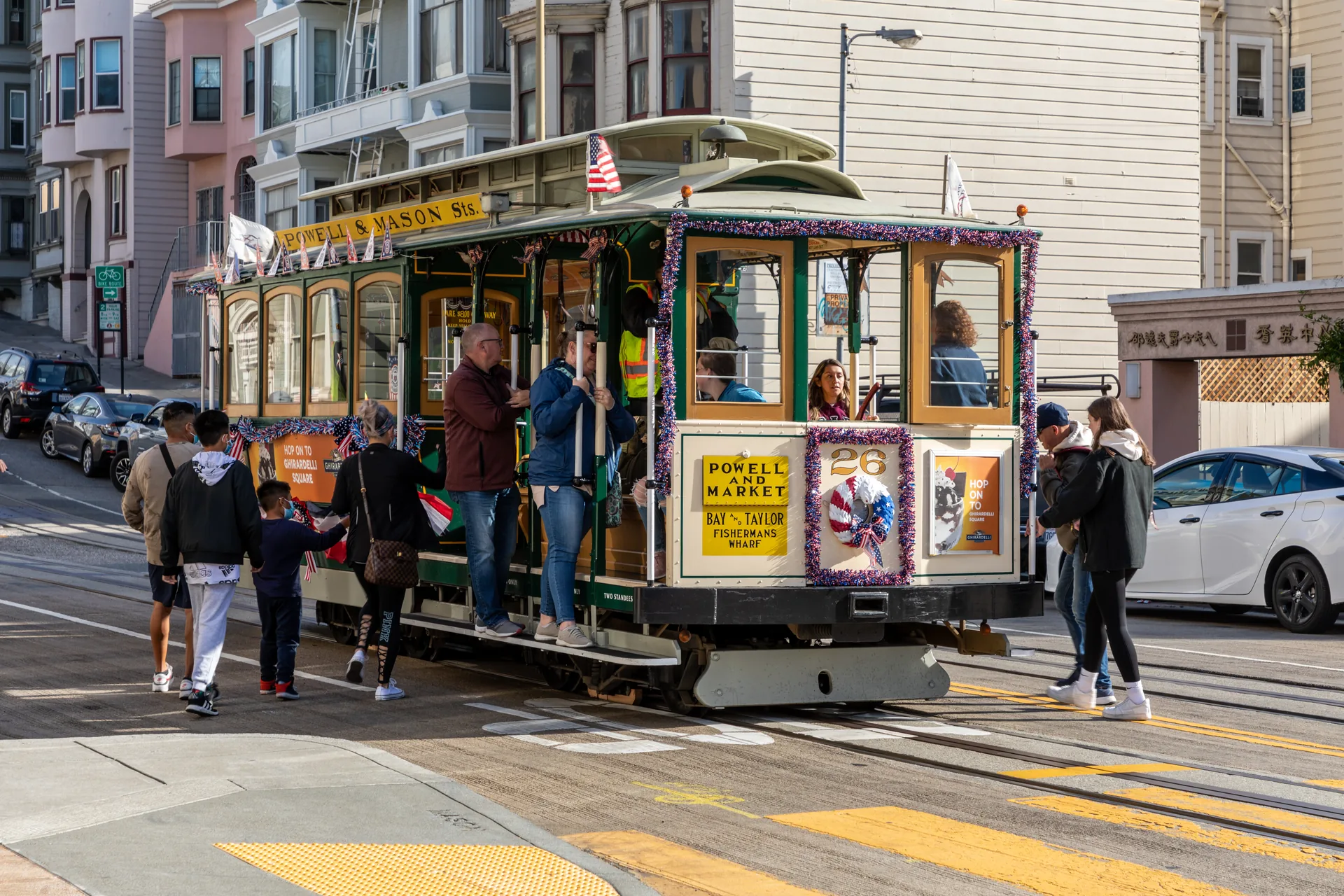 Passengers boarding a cable car on Mason Street